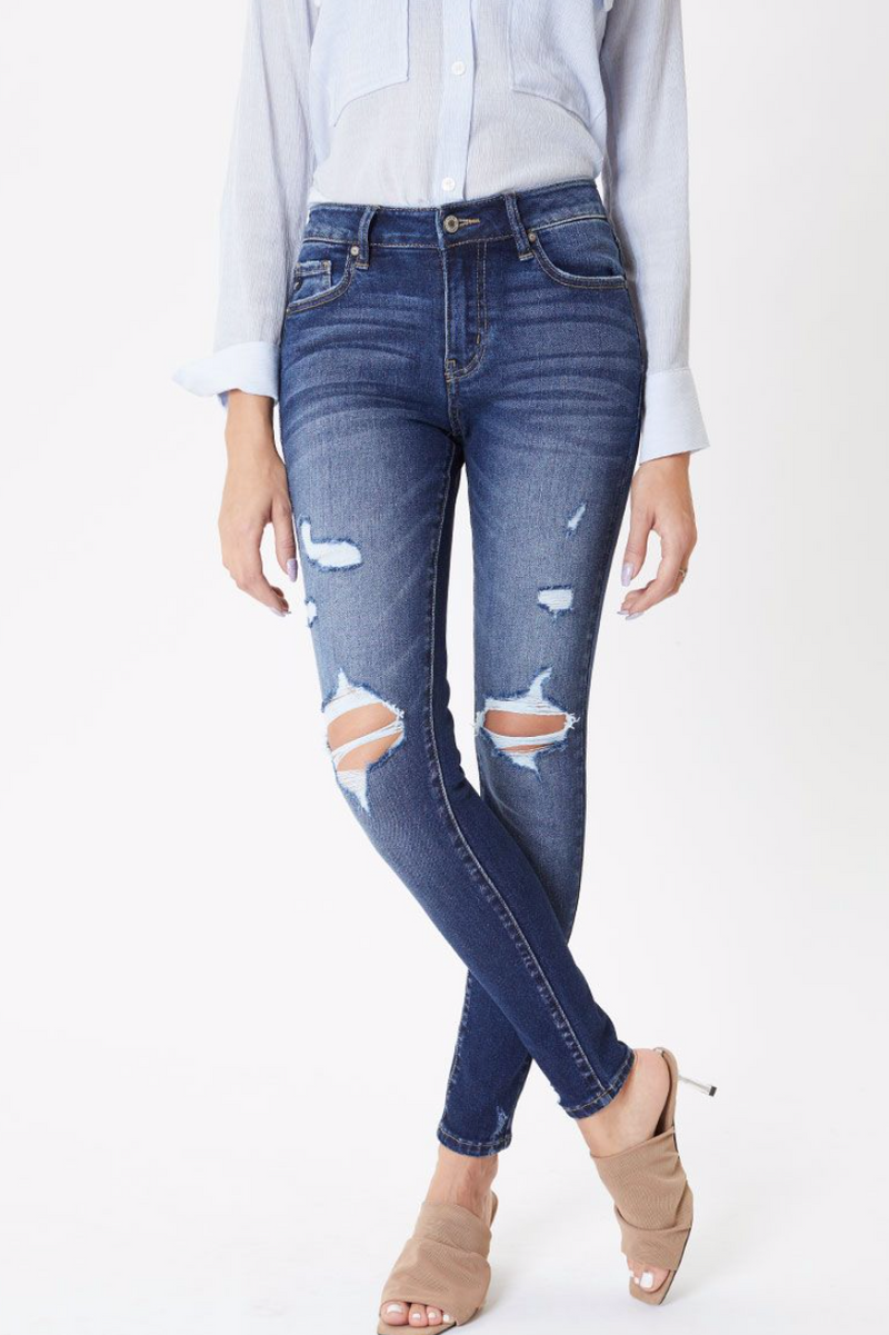 Mid rise distressed skinny jean