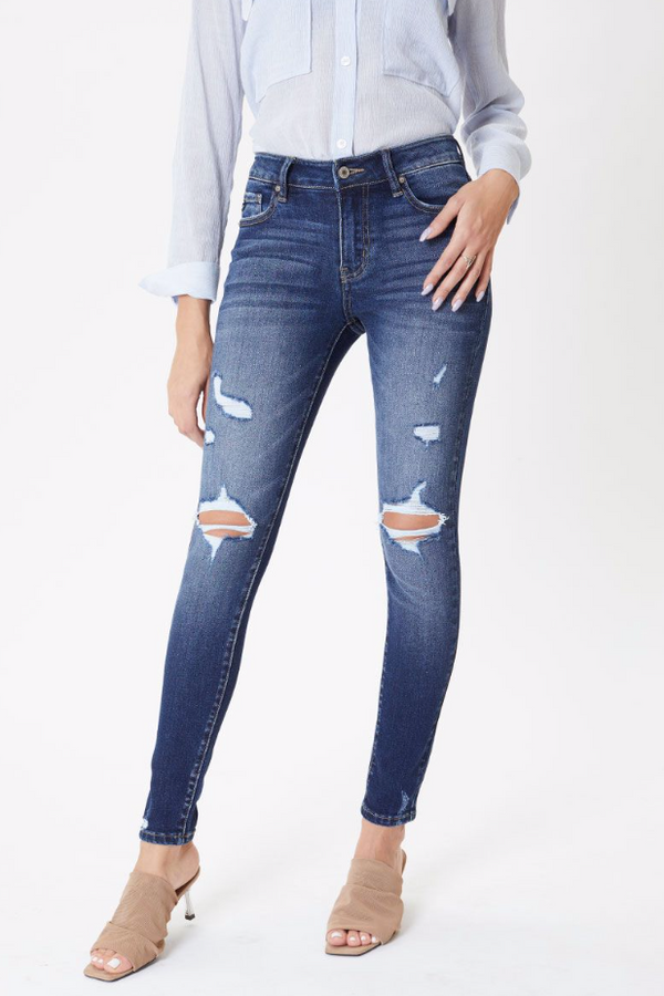Mid rise distressed skinny jean