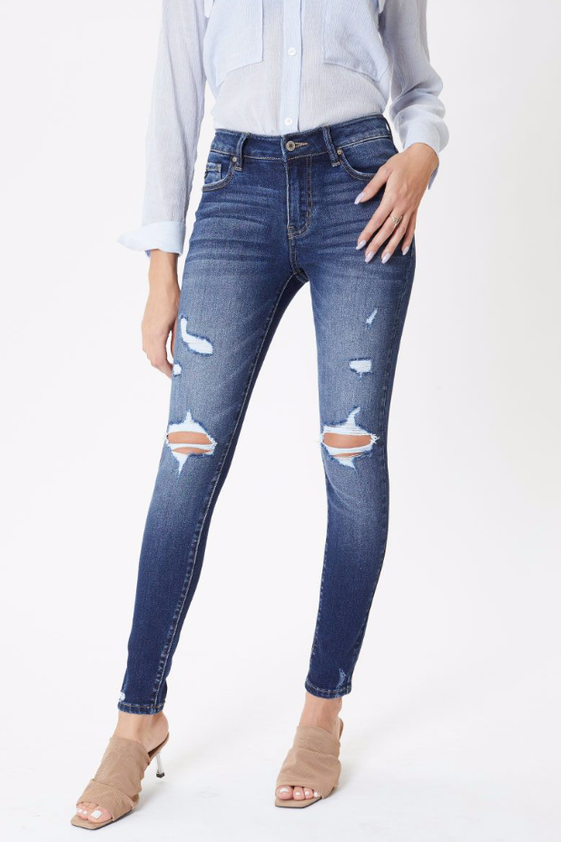 Mid rise distressed skinny jean