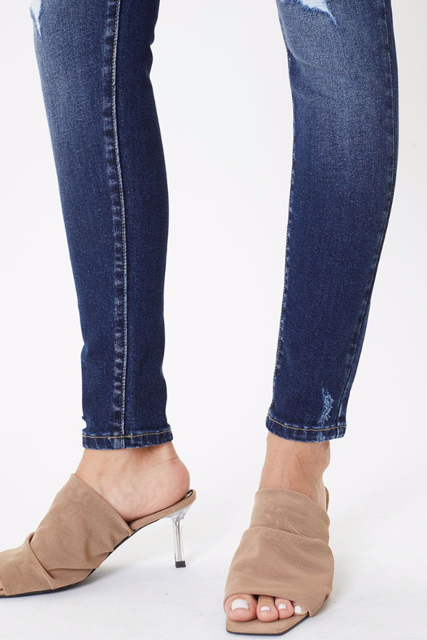 Mid rise distressed skinny jean