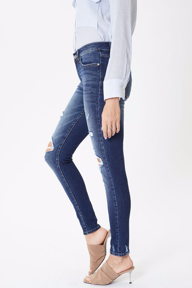 Mid rise distressed skinny jean